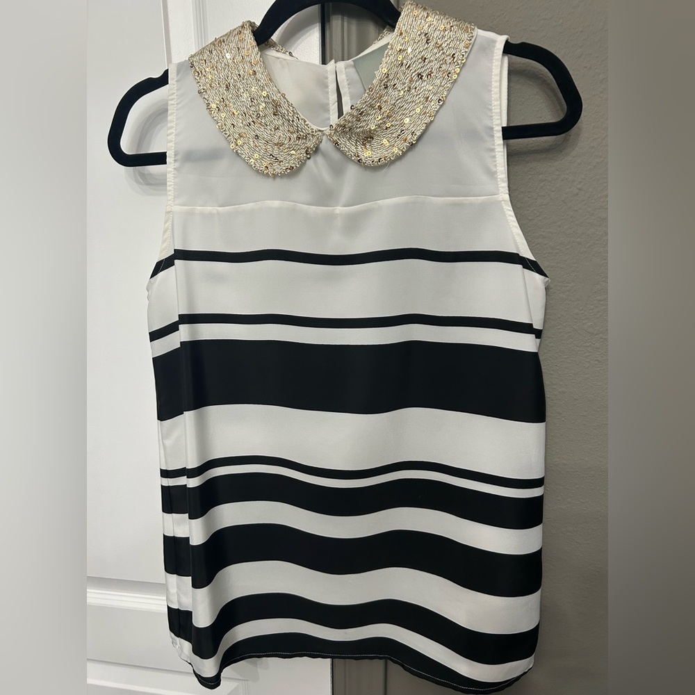 Maeve sleeveless black and white striped blouse with gold sequin collar